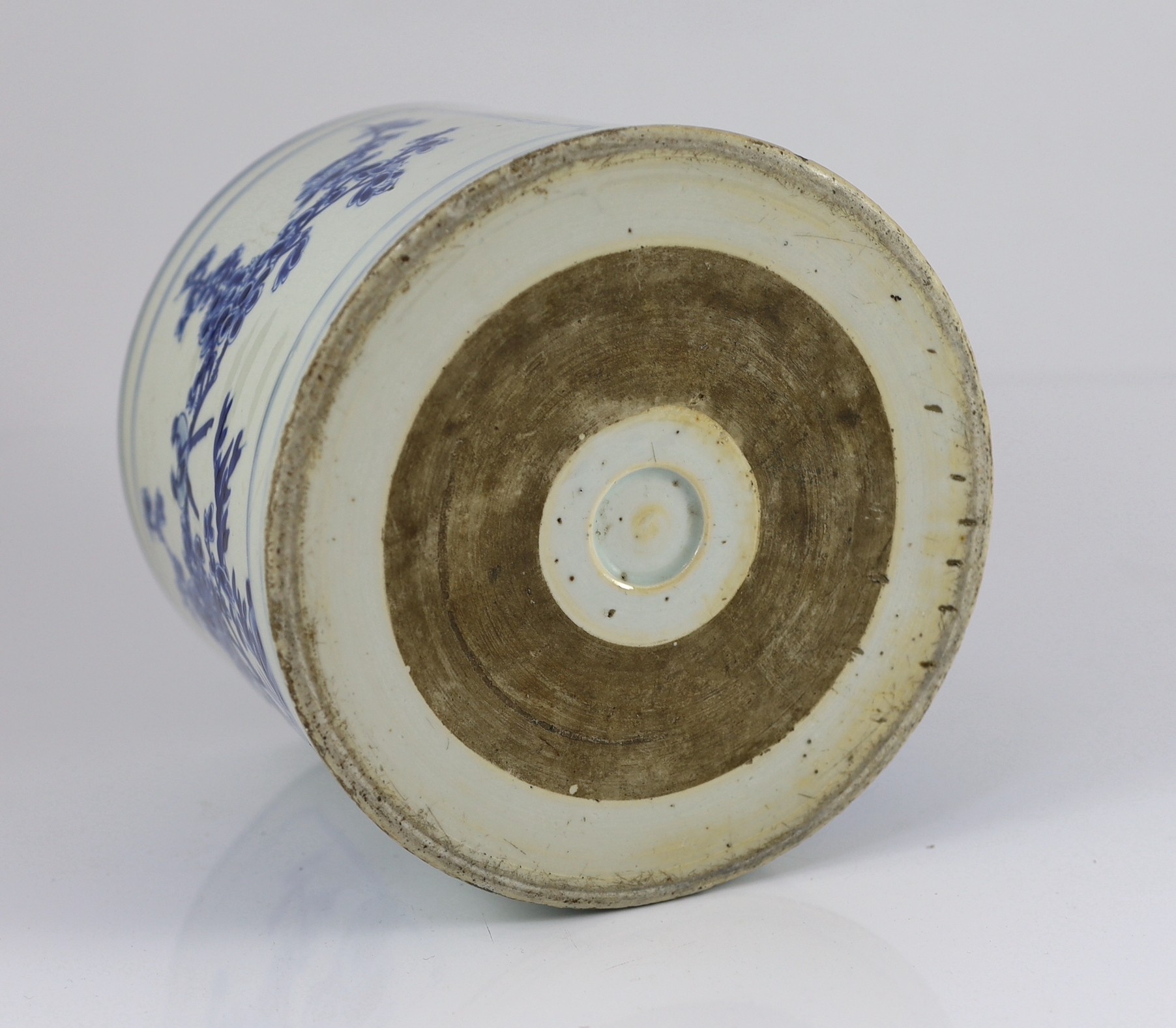 A Chinese blue and white ‘landscape’ brushpot, bitong, Kangxi period, 17.8cm diameter, 15.2cm high, fritting to edges